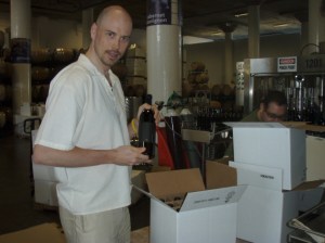 Boxing up the first bottles off the line